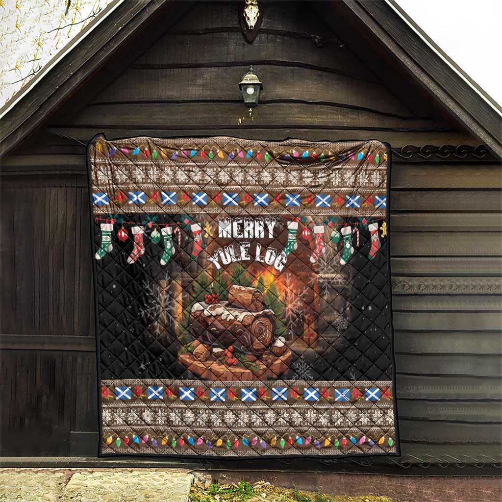 Dark quilt featuring Merry Yule Log text, log fire image, and festive patterned border.