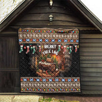 Dark quilt featuring Merry Yule Log text, log fire image, and festive patterned border.