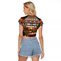 Brown cropped raglan T-shirt with back Christmas log graphic and pattern