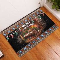 Brown rubber Christmas doormat showing 'Merry Yule Log' with illustrated log and stockings border