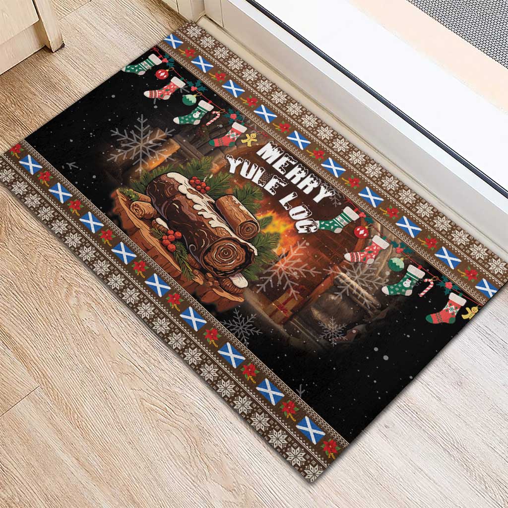 Brown rubber Christmas doormat with 'Merry Yule Log' text, log scene, snowflake and cross border