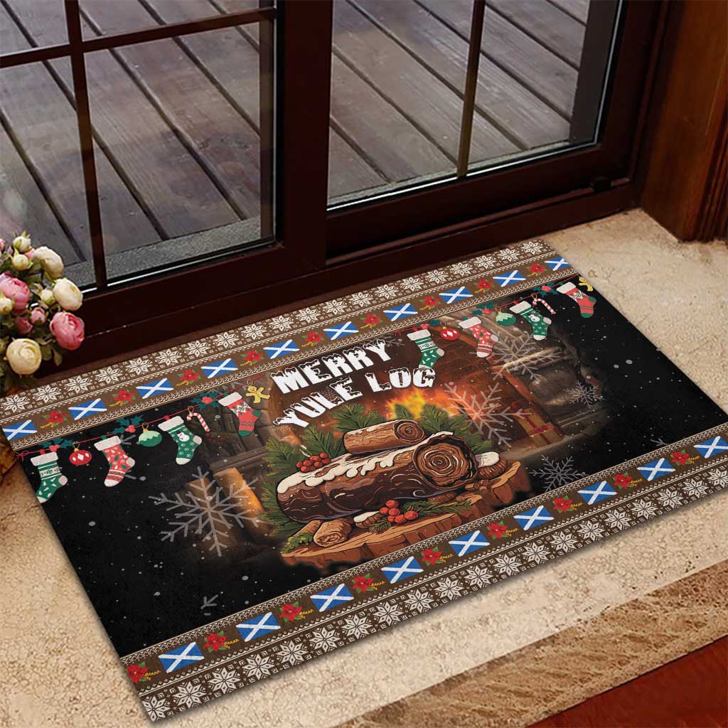 Brown rubber Christmas doormat with 'Merry Yule Log' artwork, log, snowflakes, and festive border