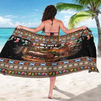 Brown and black Merry Yule Log sarong with holiday border, spread flat