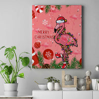 Pink flamingo Christmas canvas wall art with 'Merry Christmas' text, framed.