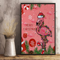 Pink flamingo Christmas canvas wall art with 'Merry Christmas' text in a black frame.