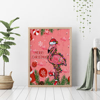 Framed pink flamingo Christmas canvas wall art with 'Merry Christmas' greeting.