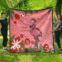 Pink flamingo holiday quilt with quilted diamond stitching, ornaments, and “Merry Christmas”