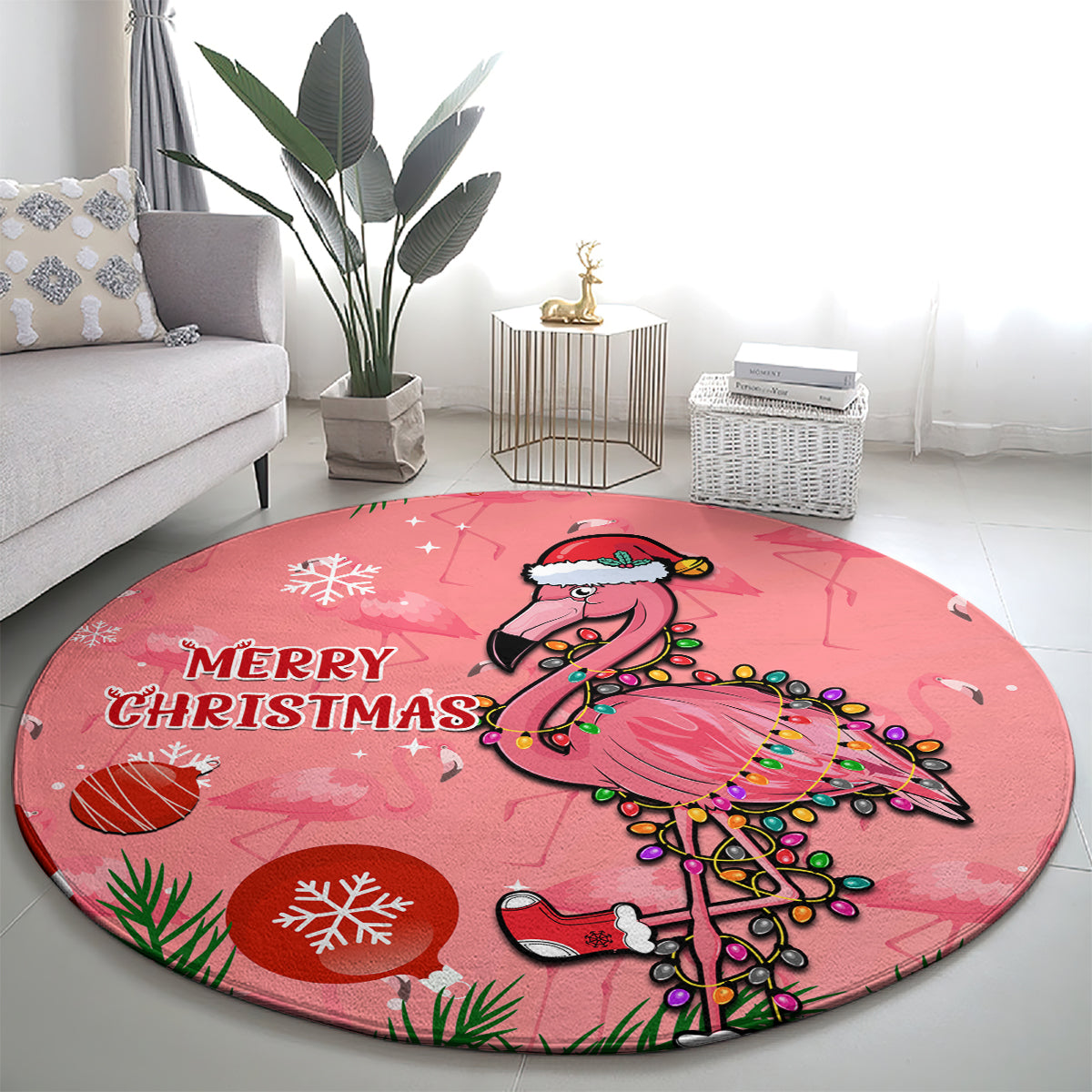Pink circular Christmas carpet showing “MERRY CHRISTMAS” and a flamingo