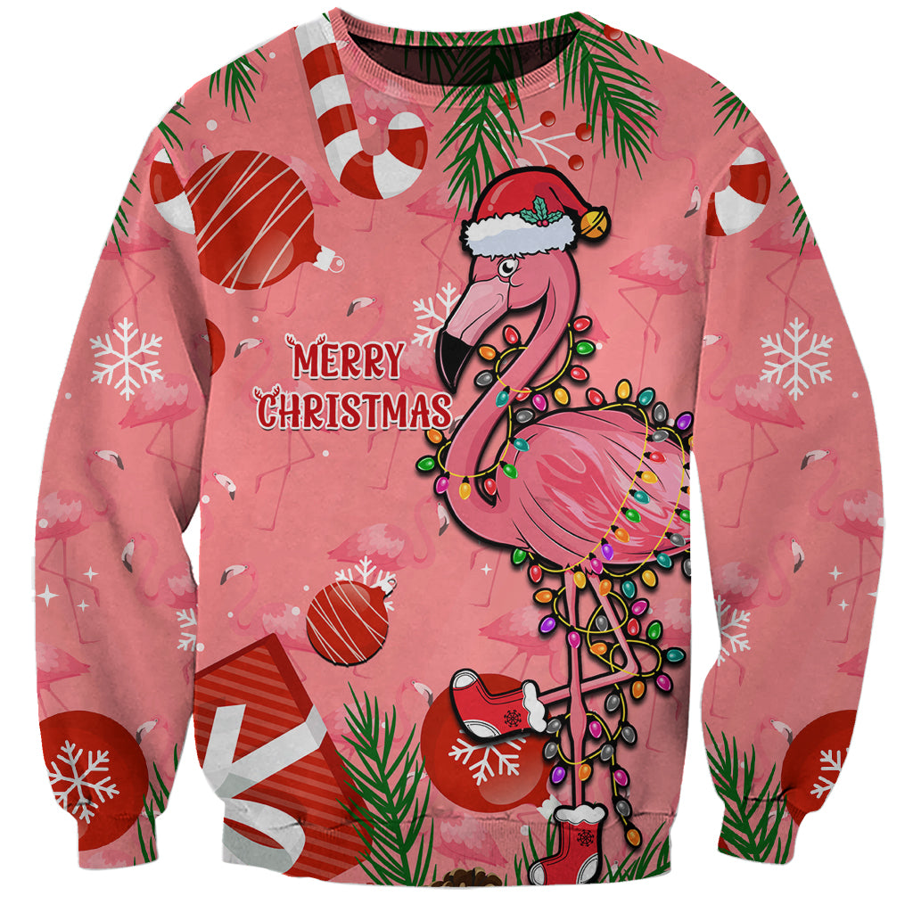 Pink crewneck Christmas sweatshirt with flamingo in Santa hat and candy cane print