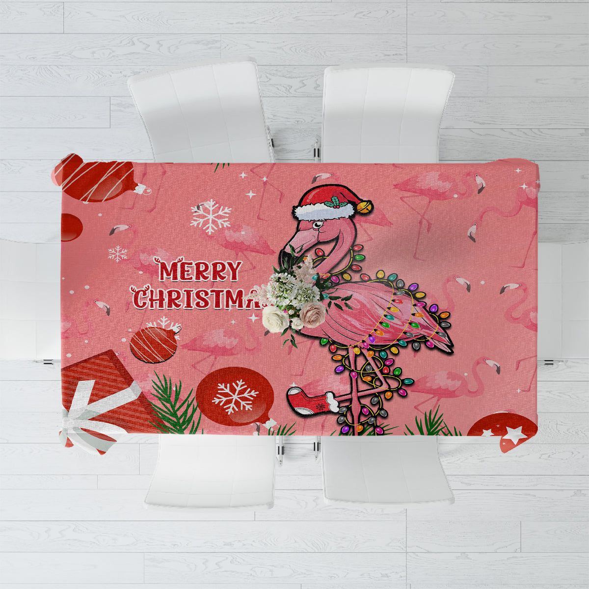 Pink flamingo Christmas tablecloth with “Merry Christmas” and snowflake decorations