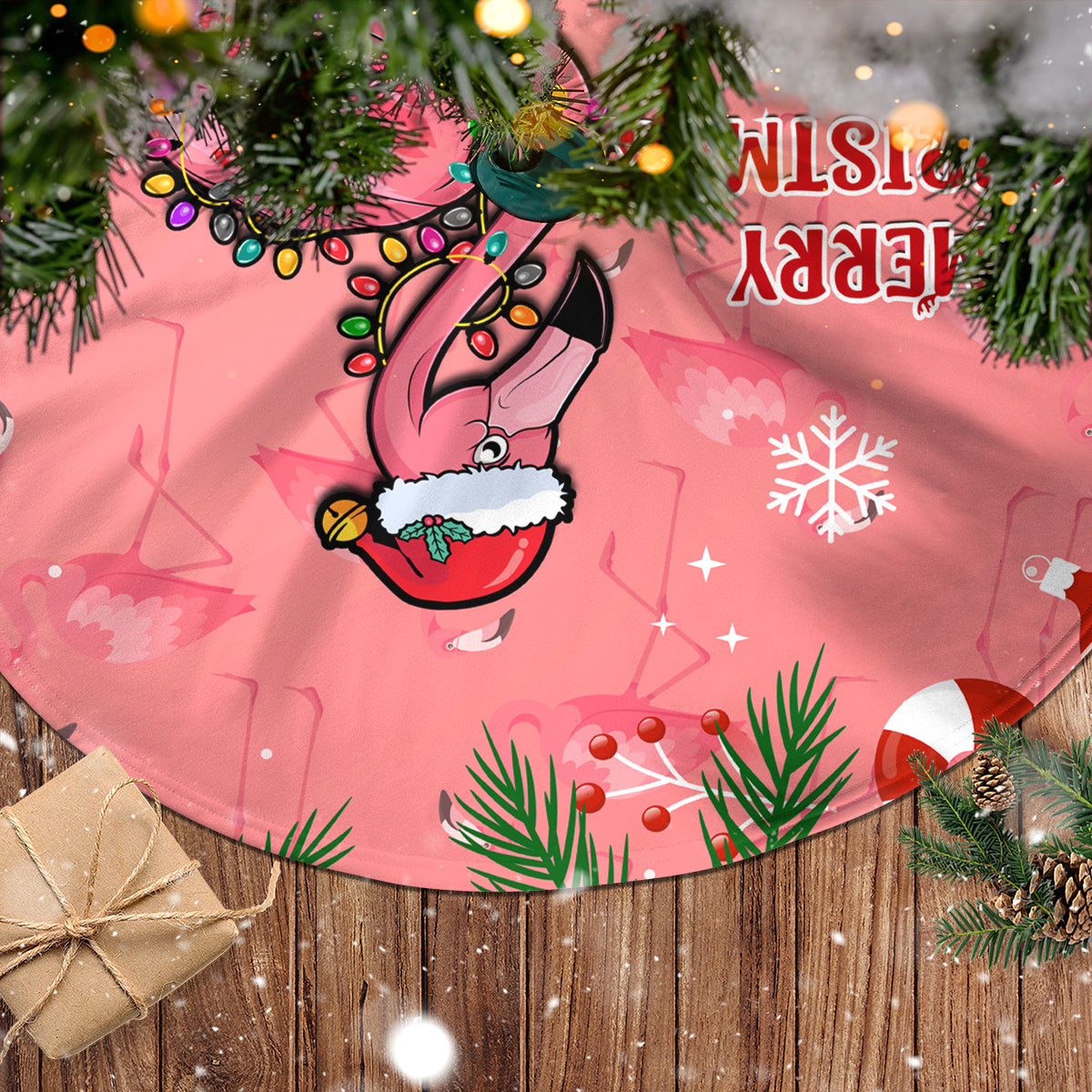 Pink flamingo Christmas tree skirt with snowflake and candy-cane icons, Merry Christmas text