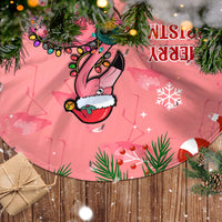 Pink flamingo Christmas tree skirt with snowflake and candy-cane icons, Merry Christmas text