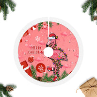 Pink flamingo Christmas tree skirt, round with white edge trim and festive pattern