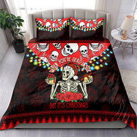 Red and black skull Christmas bedding set on bed with two pillowcases and comforter, skeleton motif.