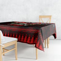 Red and black Christmas tablecloth on dining table with diamond zigzag and tree pattern