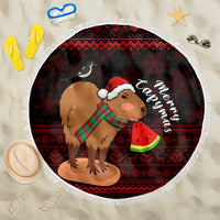 Round Christmas beach blanket with capybara wearing Santa hat, watermelon graphic, fringe edge