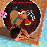 Round Christmas beach blanket, capybara in Santa hat with striped scarf, fringe border
