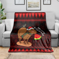 Christmas capybara throw blanket with red zigzag trim and Santa-hat capybara graphic