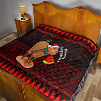 Red and black Christmas capybara quilt on a bed, with geometric border and Santa-hat capybara