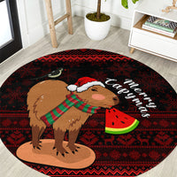 Red round Christmas rug with capybara character in Santa hat and Merry Christmas text