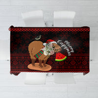 Red Christmas tablecloth featuring a capybara holding a gift in the center panel