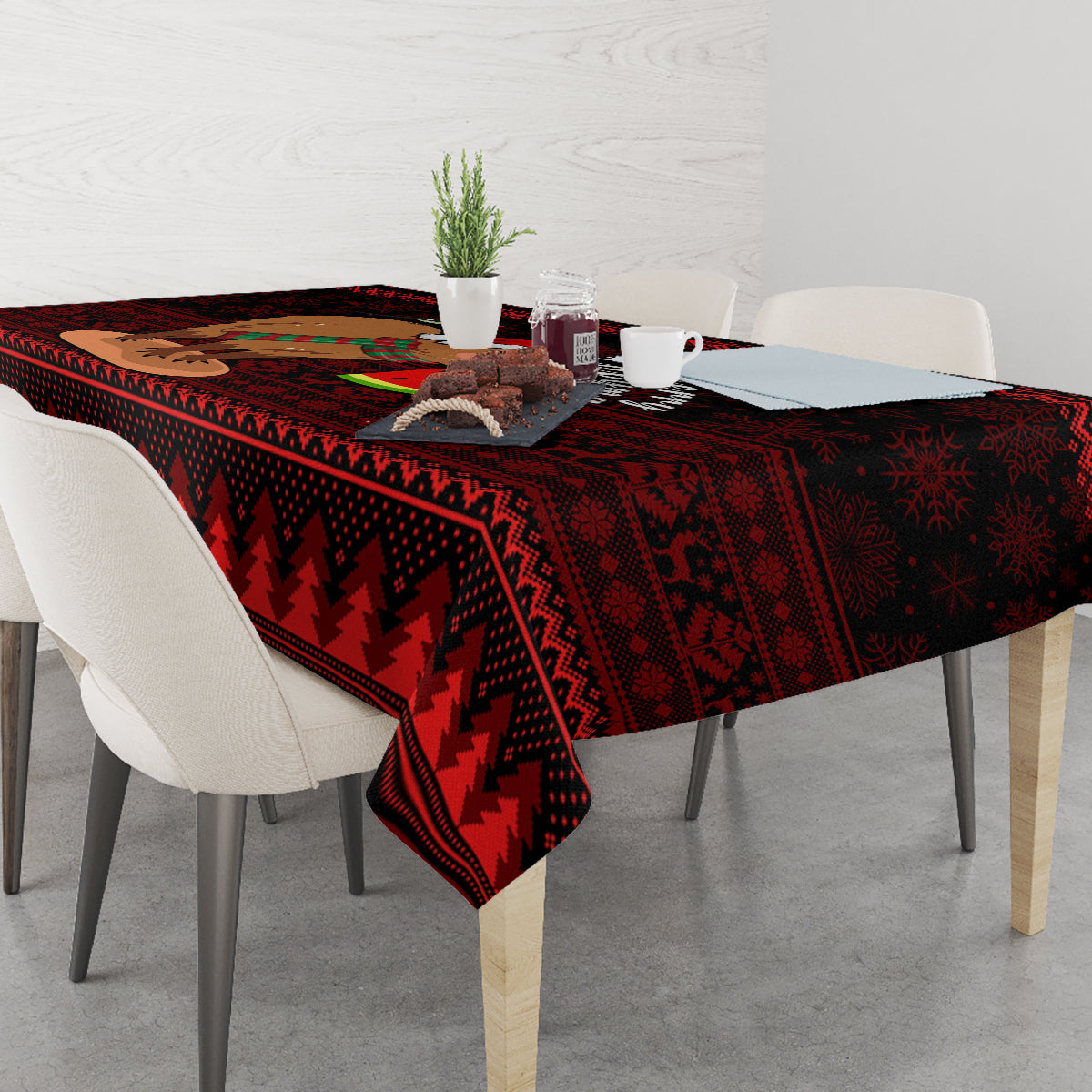 Red Christmas tablecloth with dark triangular pattern, draped on dining table