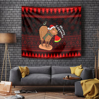Red and black Christmas tapestry featuring capybara in Santa hat holding watermelon slice