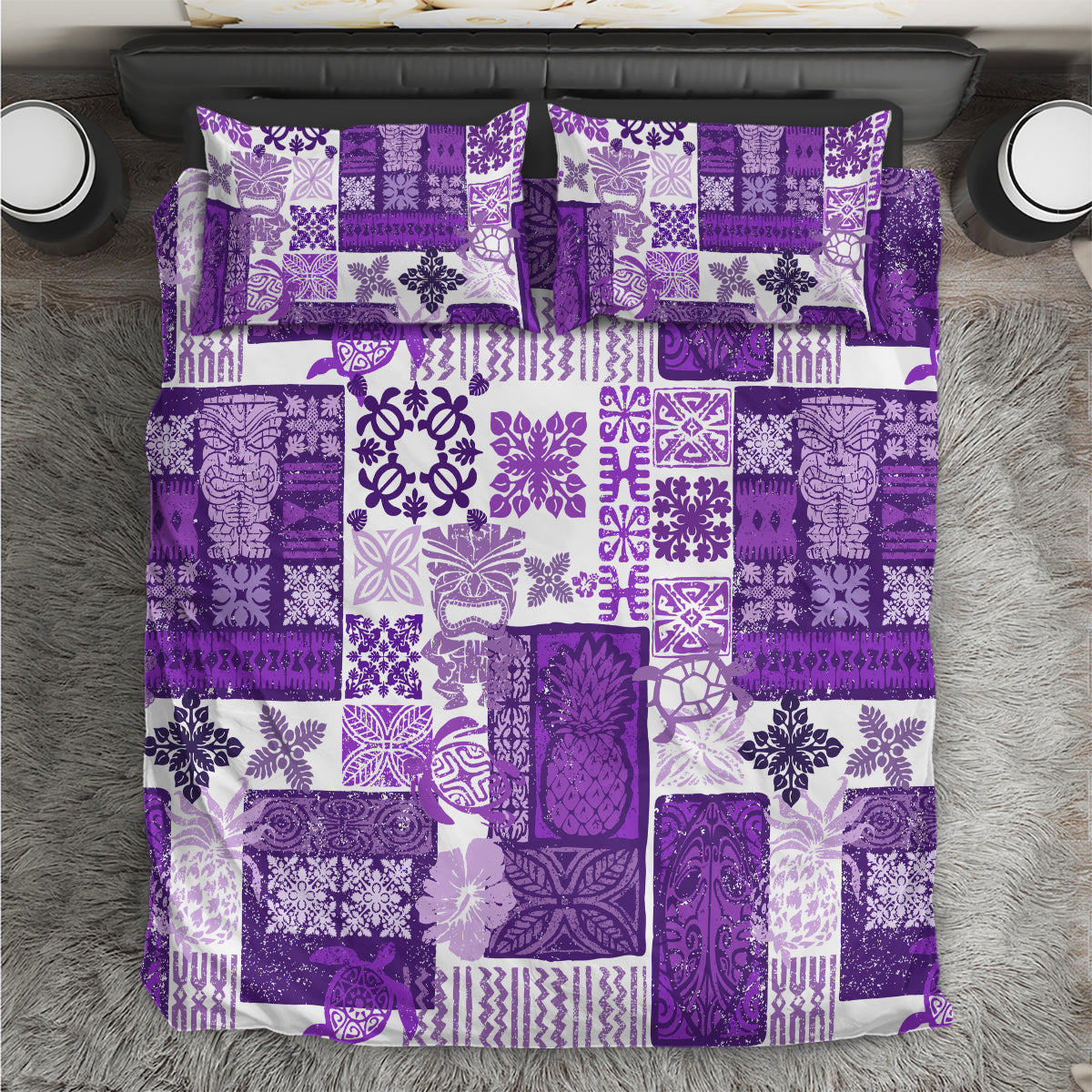 Purple and white patchwork quilt bedding set with patterned squares and pillowcases