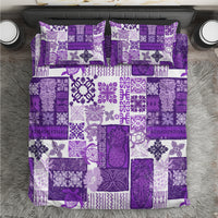 Purple and white patchwork quilt bedding set with patterned squares and pillowcases