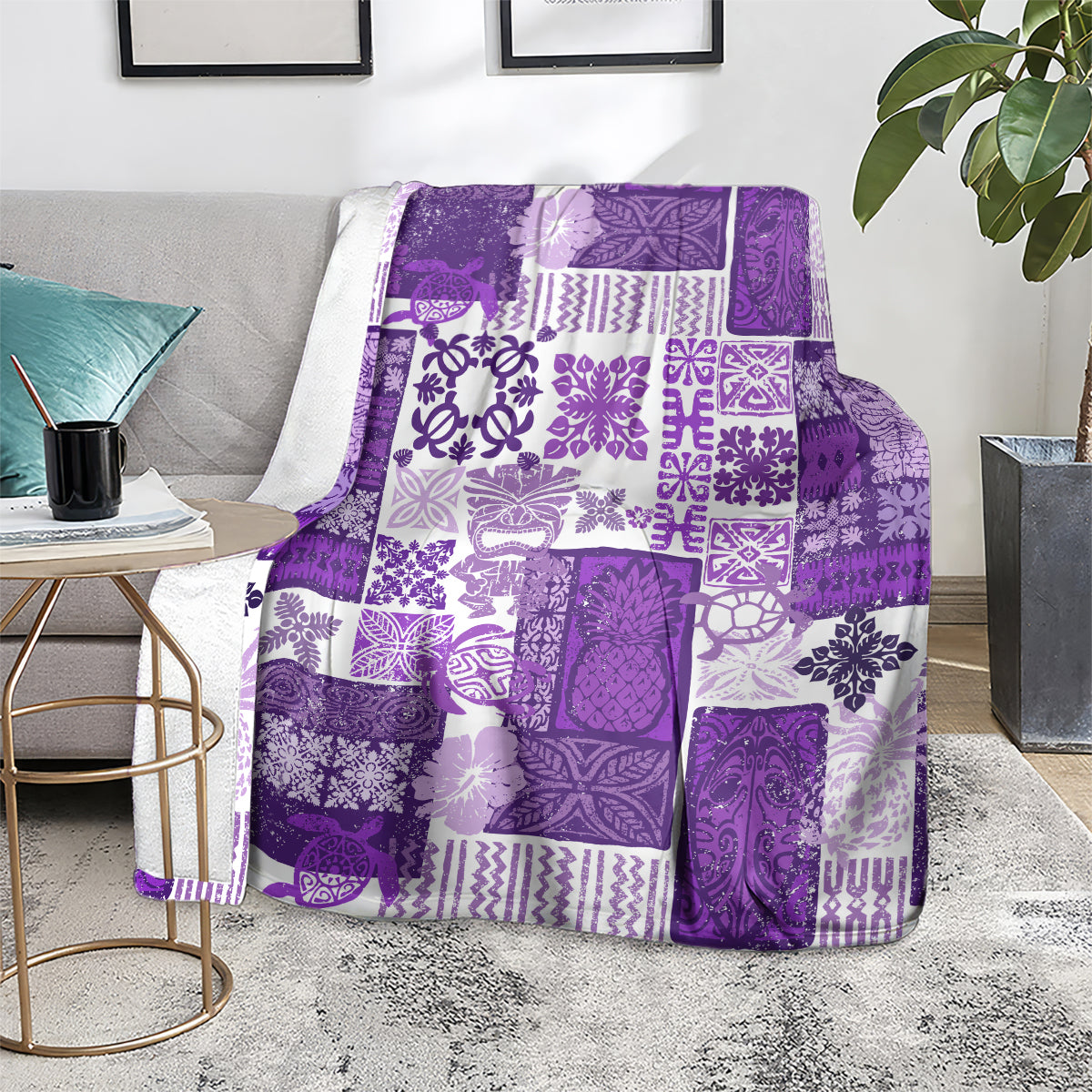 Purple tiki patchwork quilt blanket with tropical floral and geometric prints on sofa
