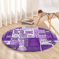 Round purple quilt-style carpet with white tiki motif patchwork and visible textured weave