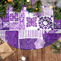 Purple tiki pattern quilt tree skirt with round opening and decorative patchwork
