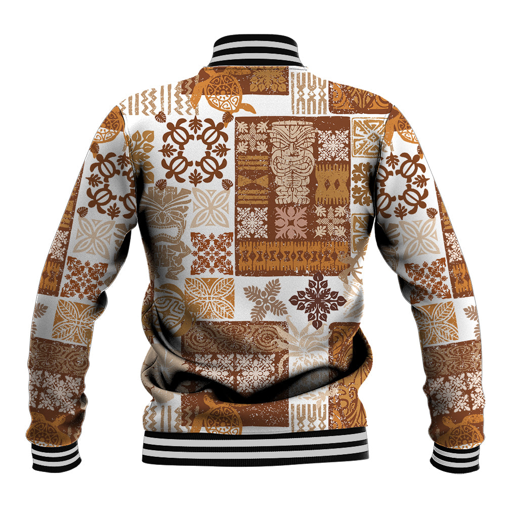 Quilt baseball jacket with brown-and-tan patchwork, ribbed hem and black/white striped cuffs.