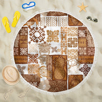 Round tiki patchwork beach blanket in brown and white with white fringe trim