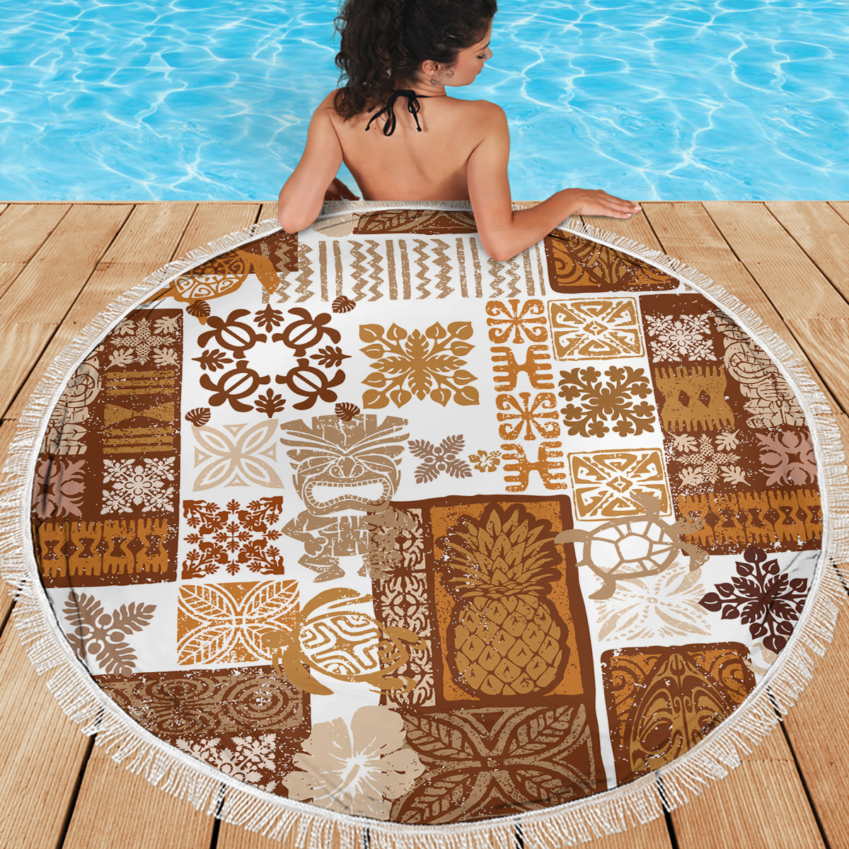 Round tiki patchwork beach blanket in brown and white with white fringed border