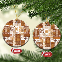 Brown quilt-style ceramic circle ornament with hanging gold string
