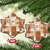 Brown quilt-style ceramic snowflake ornament with gold hanging string