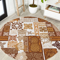 Brown round rug with white tiki motifs in square patchwork layout
