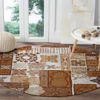 Brown round rug with tiki patchwork blocks and geometric floral motifs