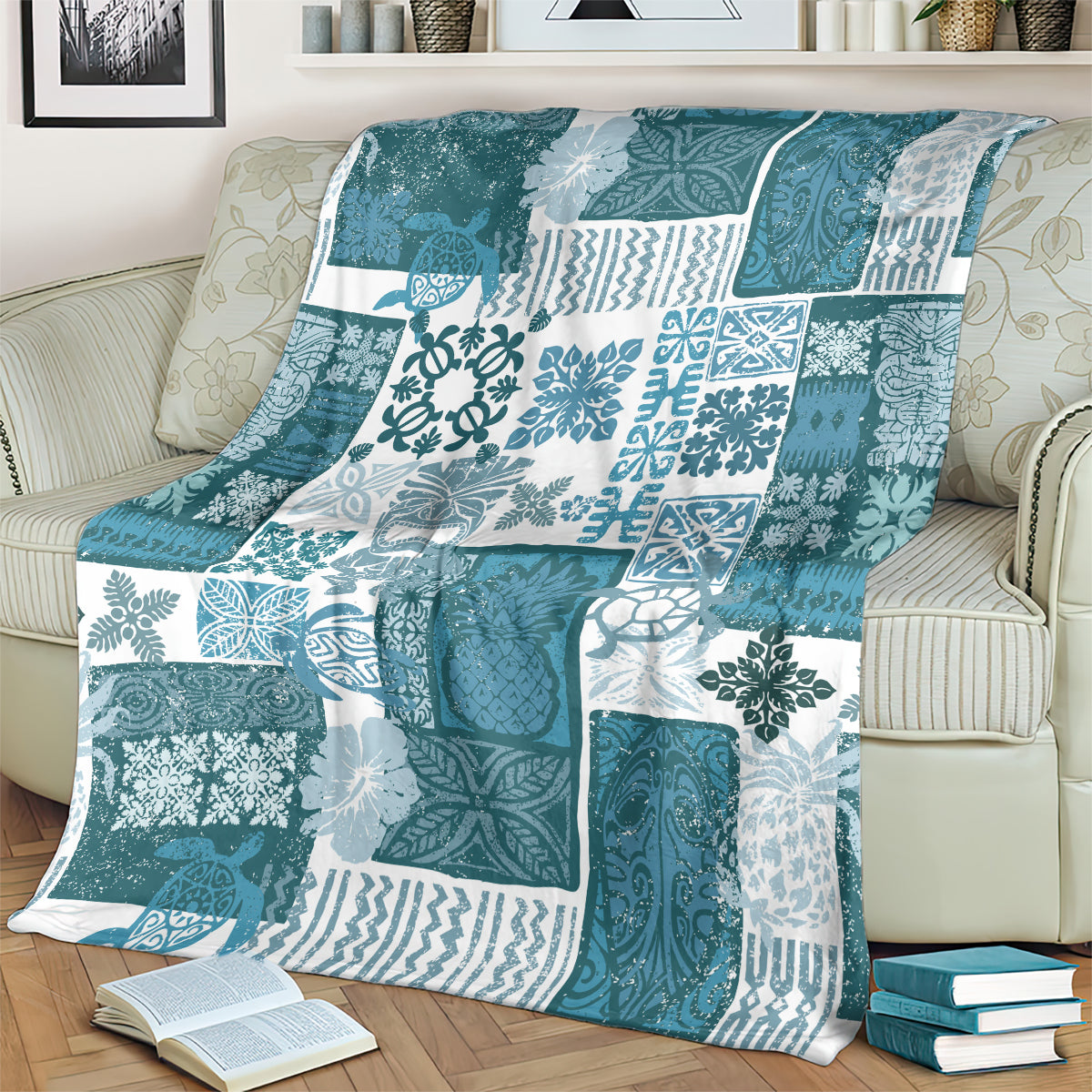 Dark cyan patchwork quilt blanket with tiki tropical motifs and white accents