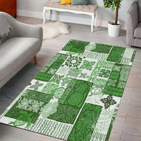 Green and white patchwork tiki tropical area rug with quilt-style pattern