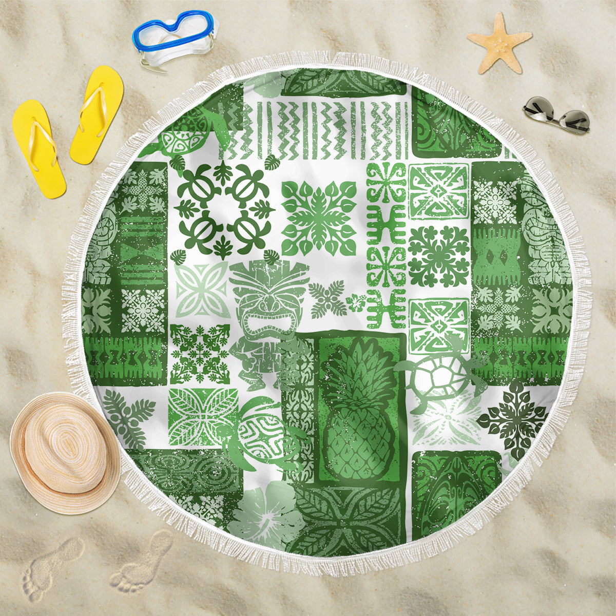 Green round beach blanket with white tiki patchwork and white fringe border