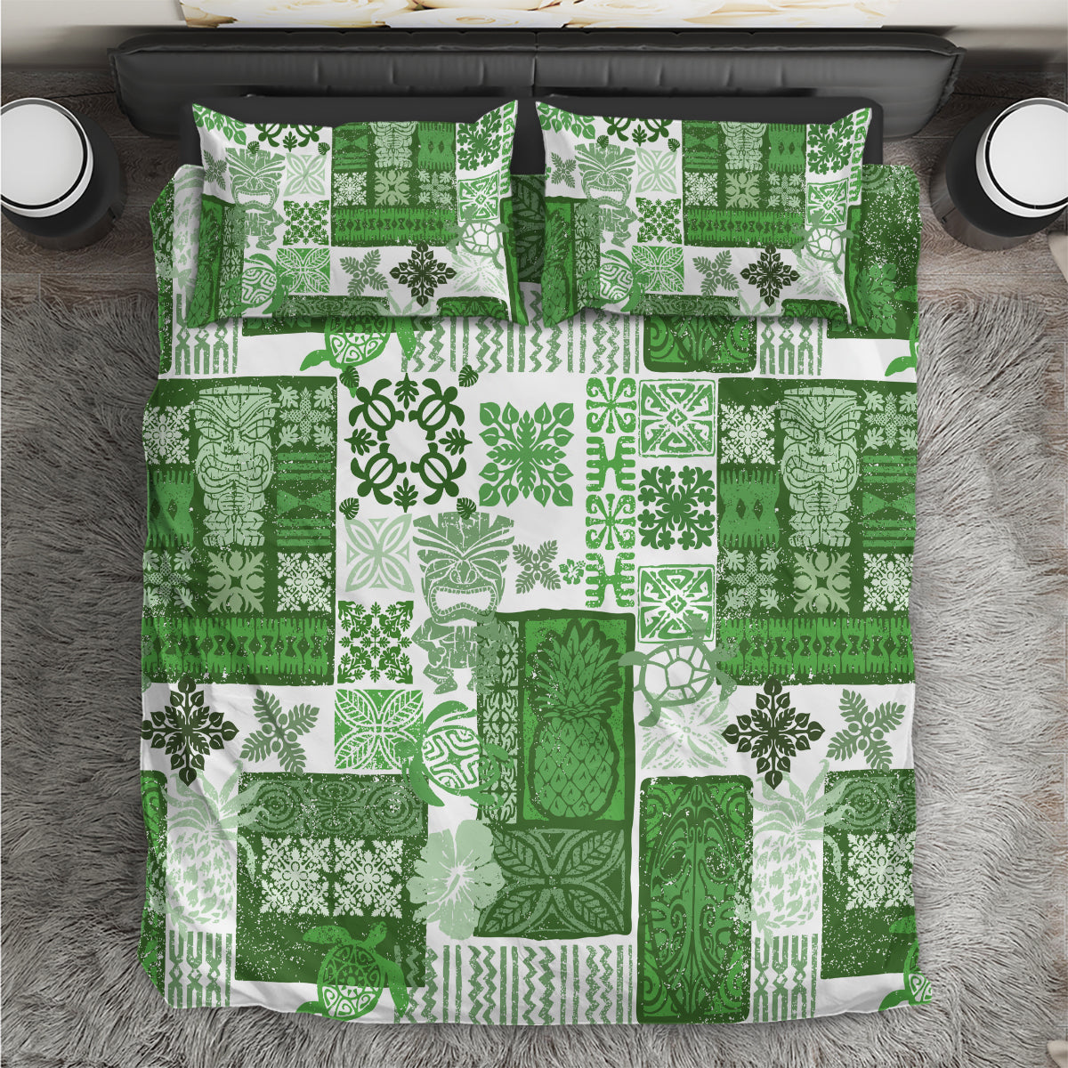 Green quilt bedding set with patchwork tropical leaf/geometric pattern and two matching pillows
