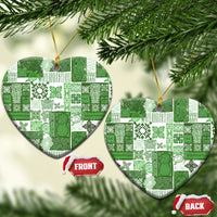 Green patchwork ceramic heart ornament with gold hanging loop; front and back shown