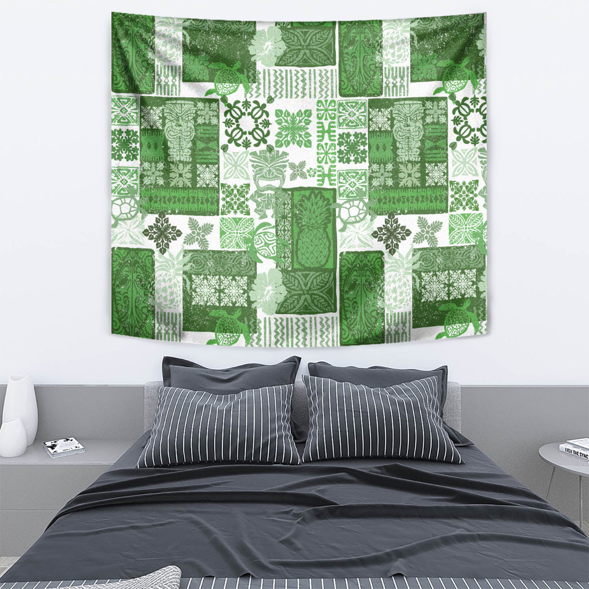 Green tropical patchwork tapestry with tiki, leaf, and geometric print blocks
