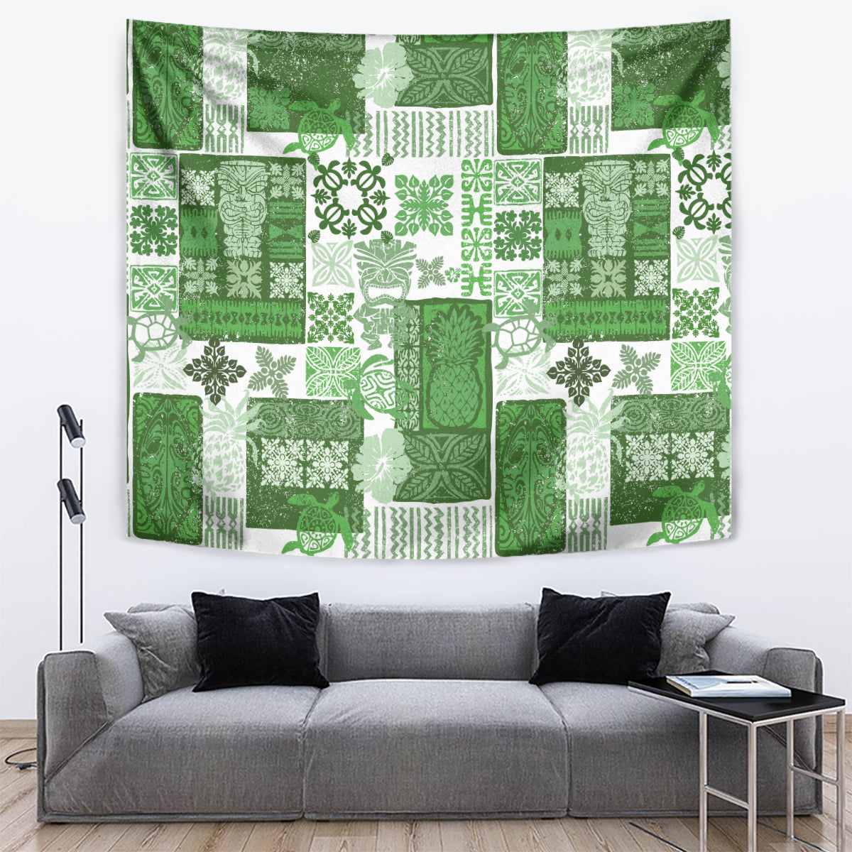 Green tropical quilt-style tapestry with patchwork tiki and floral patterns