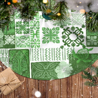 Green and white Tiki-pattern tree skirt with circular patchwork design