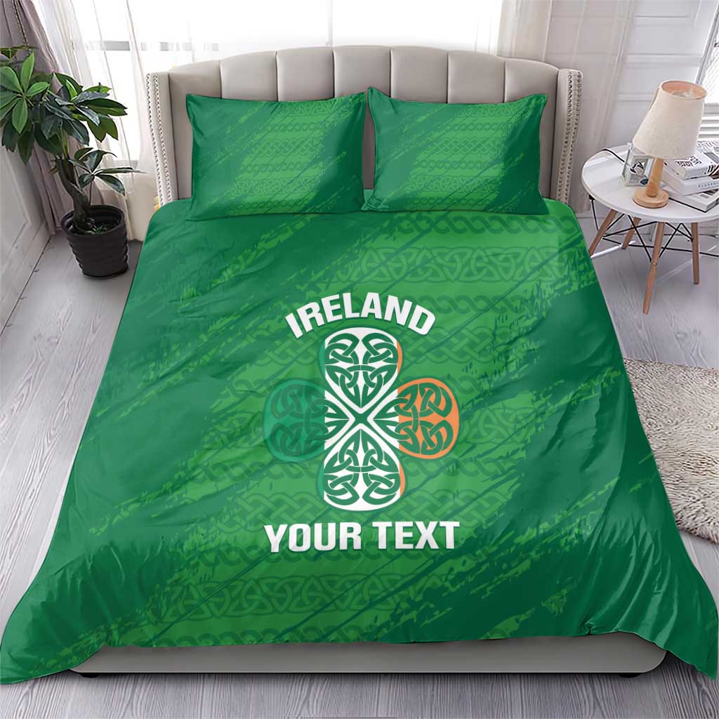 Green duvet cover and two pillowcases featuring Ireland text and a white Celtic knot emblem