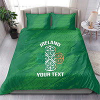 Green duvet cover and two pillowcases featuring Ireland text and a white Celtic knot emblem