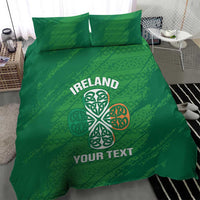 Green bedding set with Ireland text and Celtic knot design, shown on the bed with two pillows